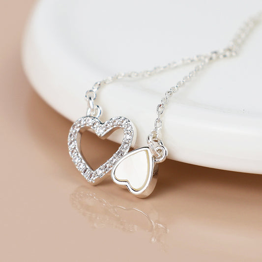 Silver Plated Topsy Turvy Hearts Necklace with Crystal and Pearl Detail