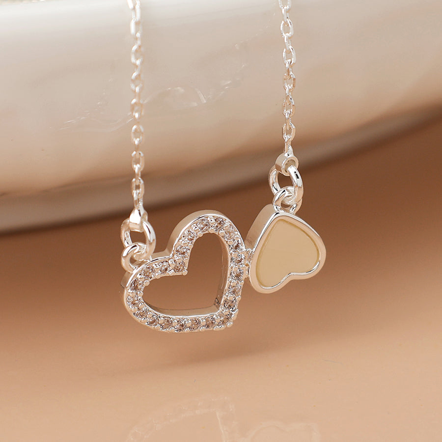 Silver Plated Topsy Turvy Hearts Necklace with Crystal and Pearl Detail