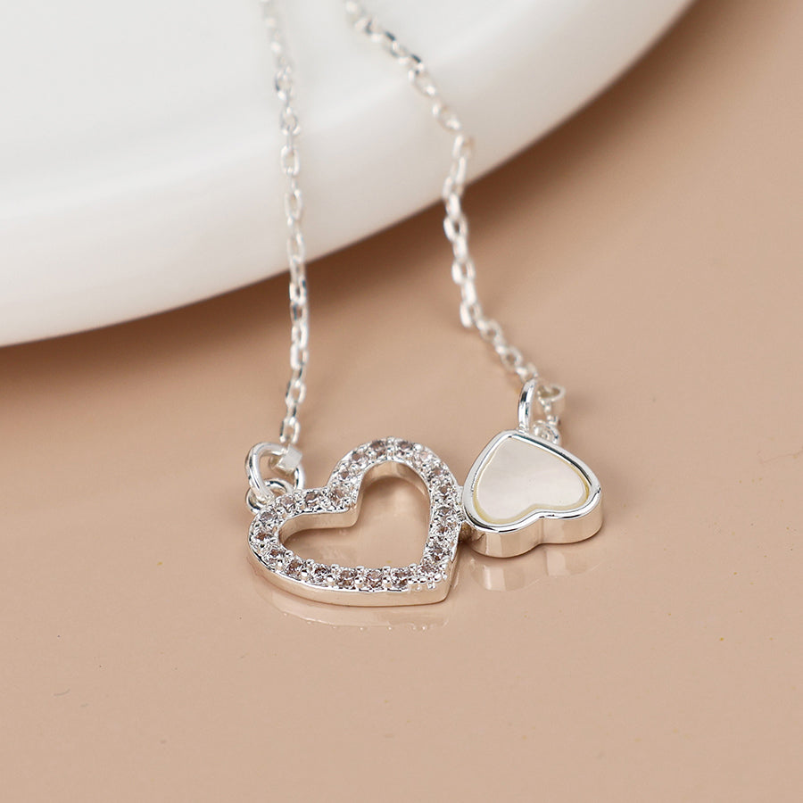 Silver Plated Topsy Turvy Hearts Necklace with Crystal and Pearl Detail
