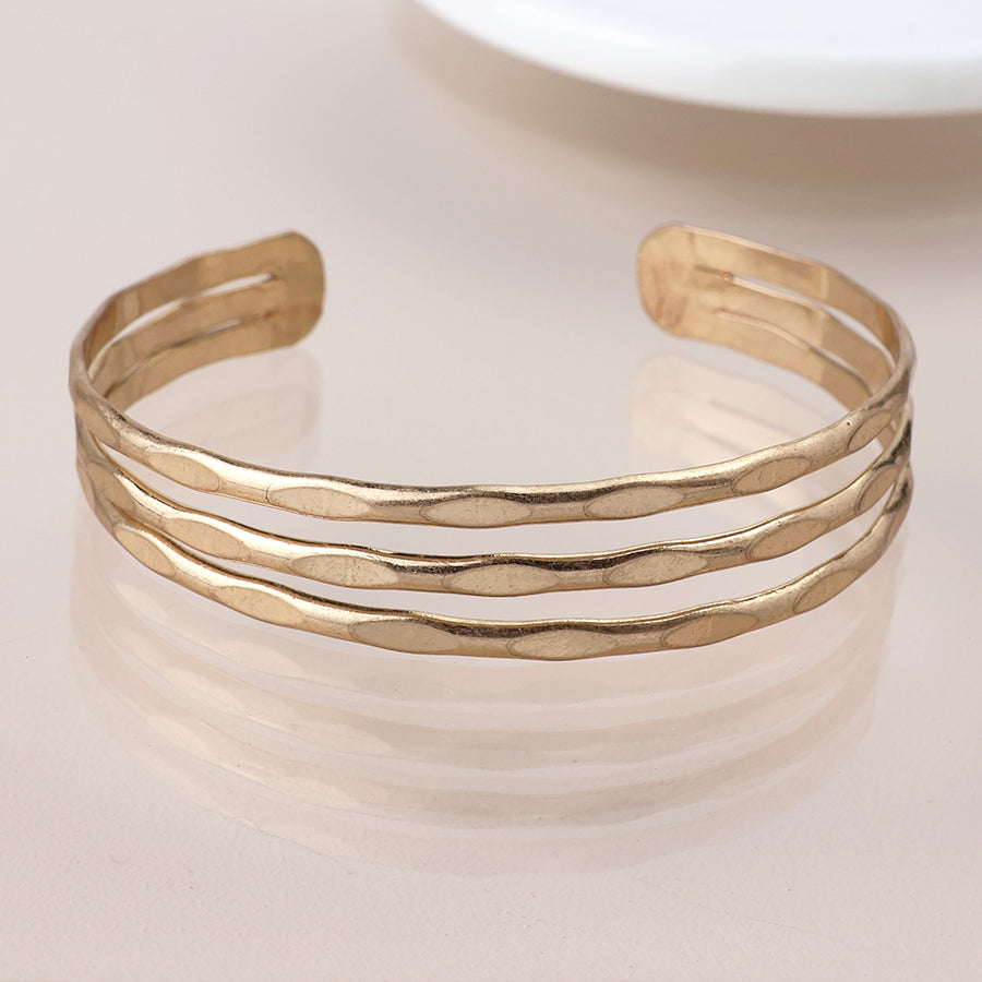 Gold Plated Worn Hammered Triple Strand Bangle