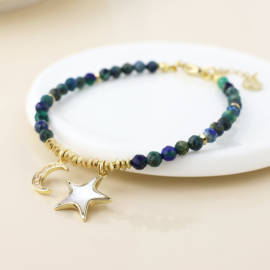 Golden and dark bead moon and star charm bracelet