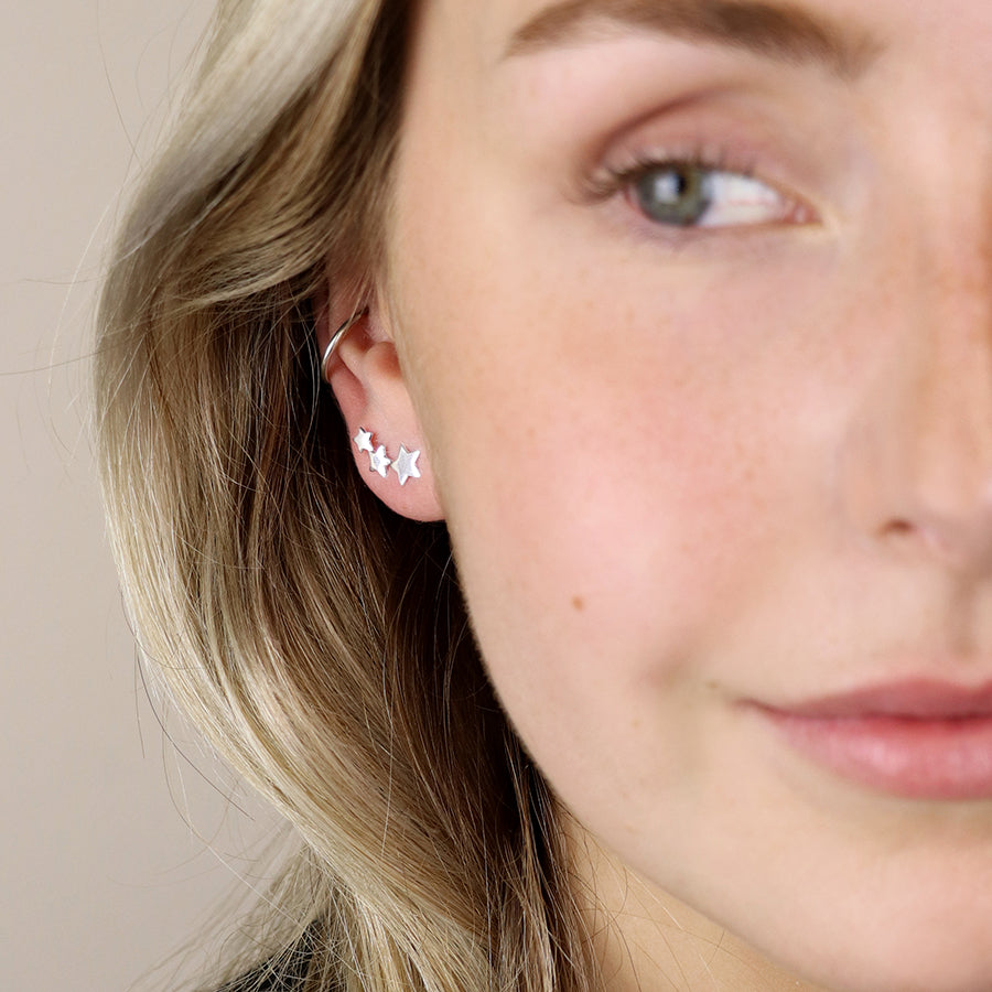 Sterling Silver Row of Stars Stud Earrings