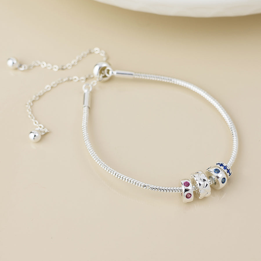 Silver plated multi ring bracelet with crystals
