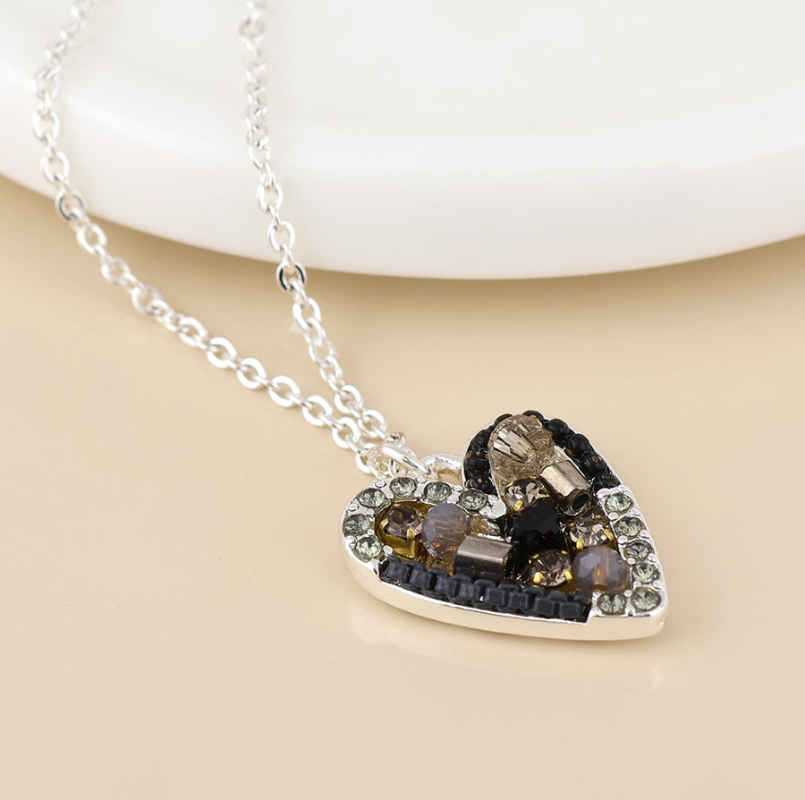 Rebel silver plated black and bronze mosaic crystal heart necklace