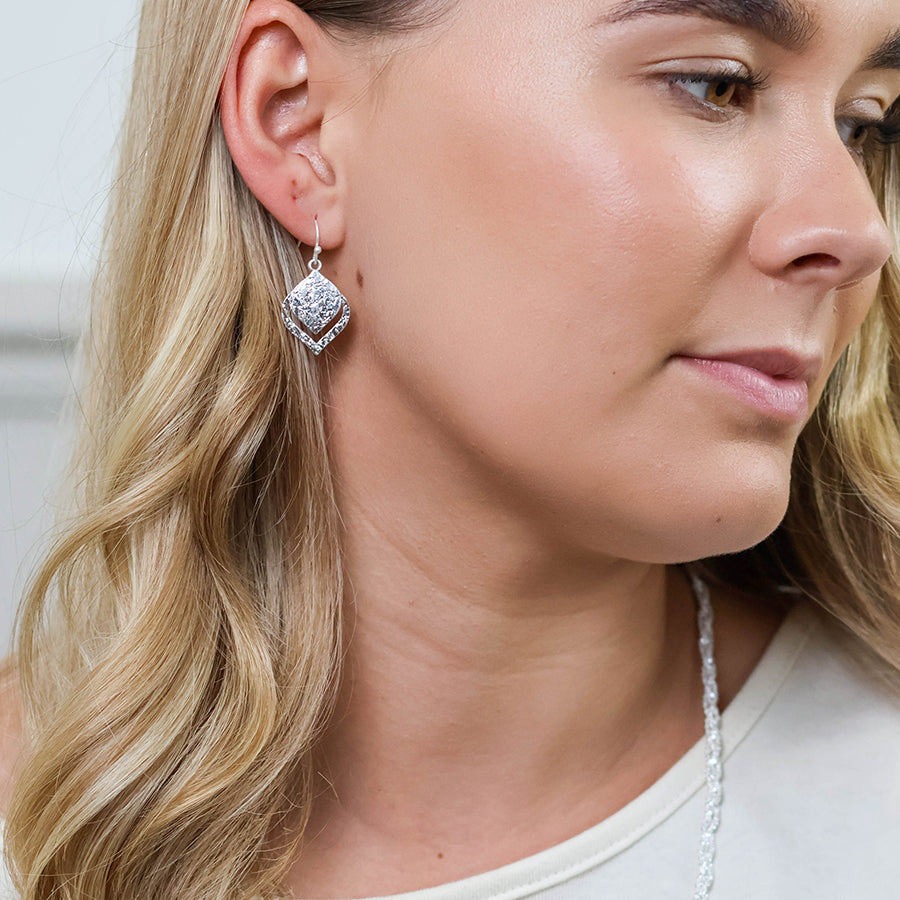 Halo silver plated foil textured layered leaf drop earrings