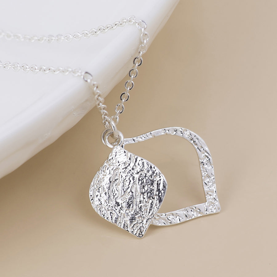 Halo silver plated foil textured layered leaf necklace
