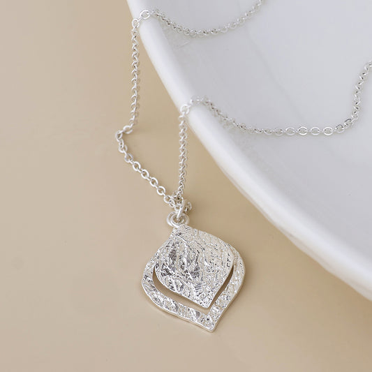 Halo silver plated foil textured layered leaf necklace