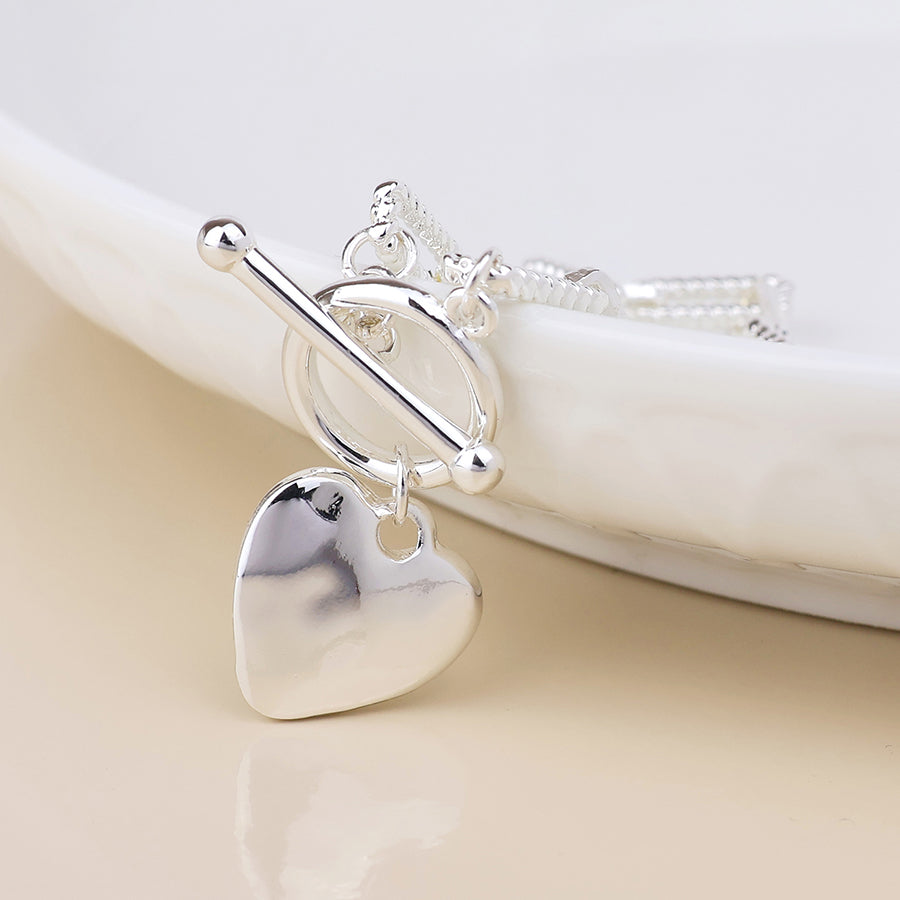 Foundry silver plated heart and t-bar bracelet with twist links