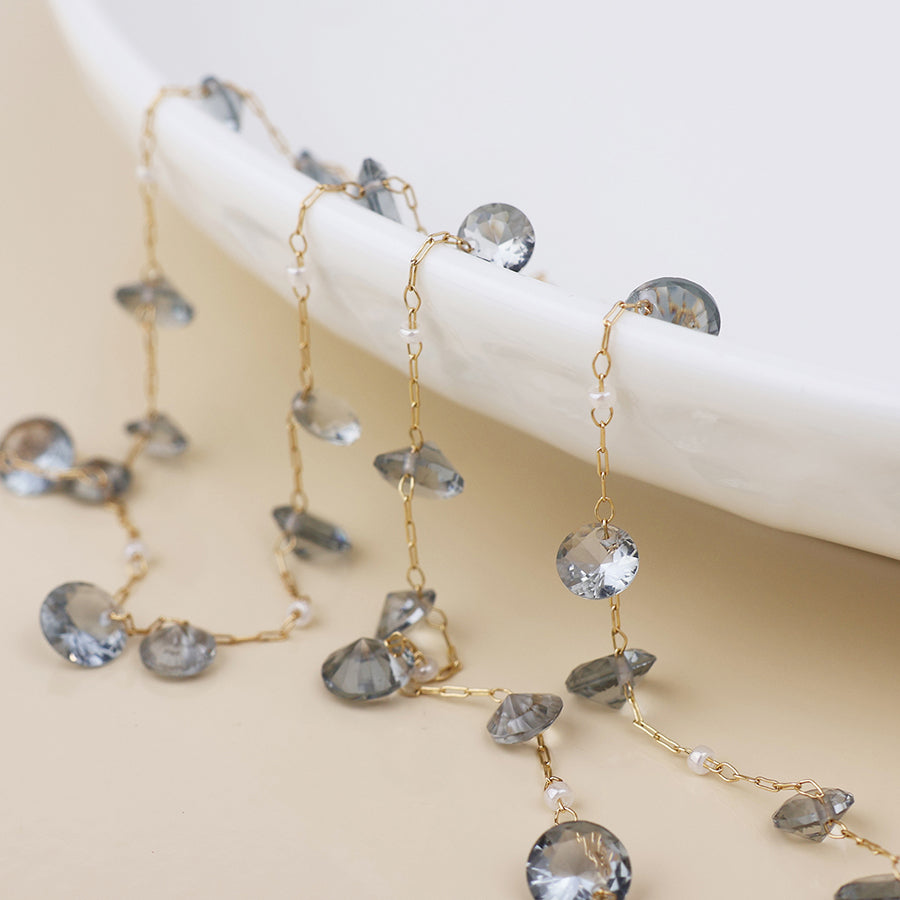 Lyra golden station necklace with smoky crystal drops and pearls