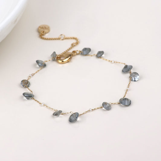Lyra golden station bracelet with smoky crystal drops and pearls