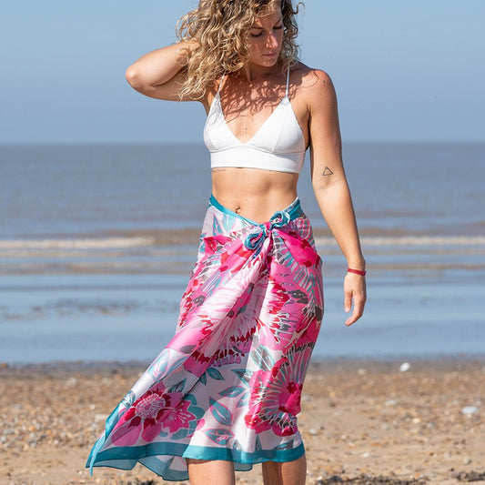 Peace Of Mind (POM) Tropical Flower Print Lightweight Silk Feel Scarf. Available at Sweet P, Burnside, Glasgow