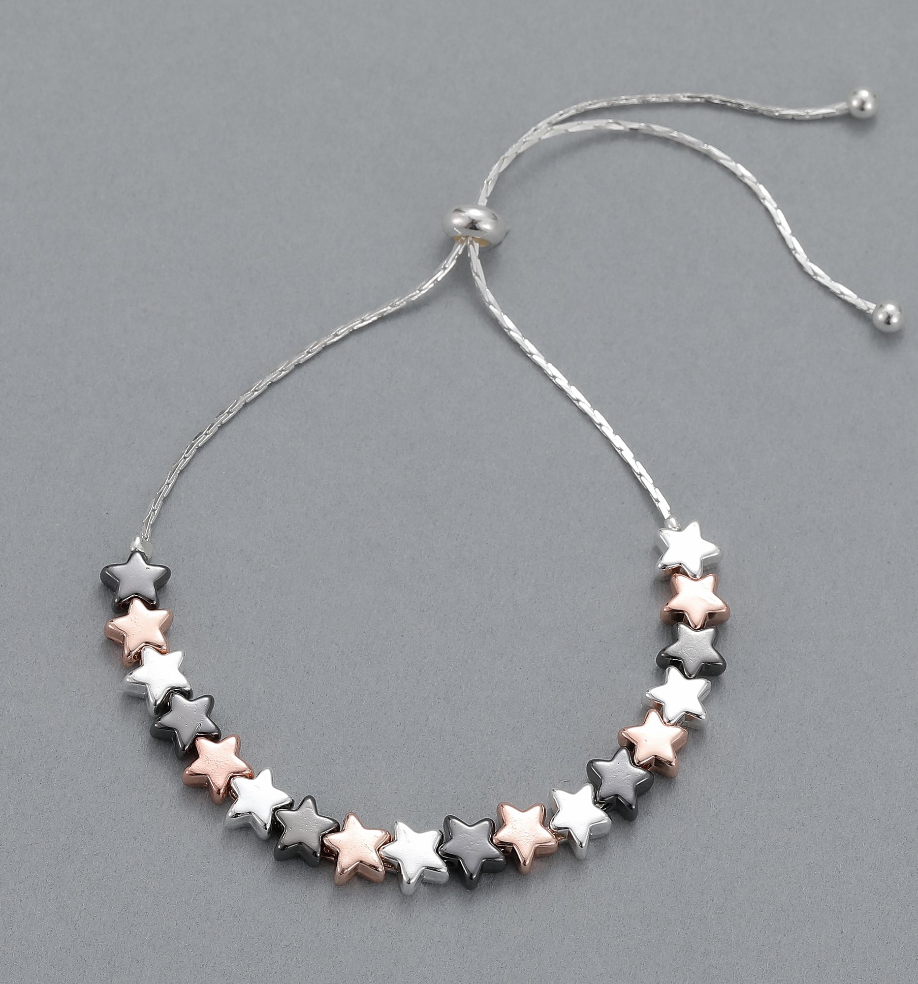 Gracee Jewellery Rose Gold, Black and Silver Plated Star Bracelet | Adjustable Pull-Cord Design. Available at Sweet P, Burnside, Glasgow