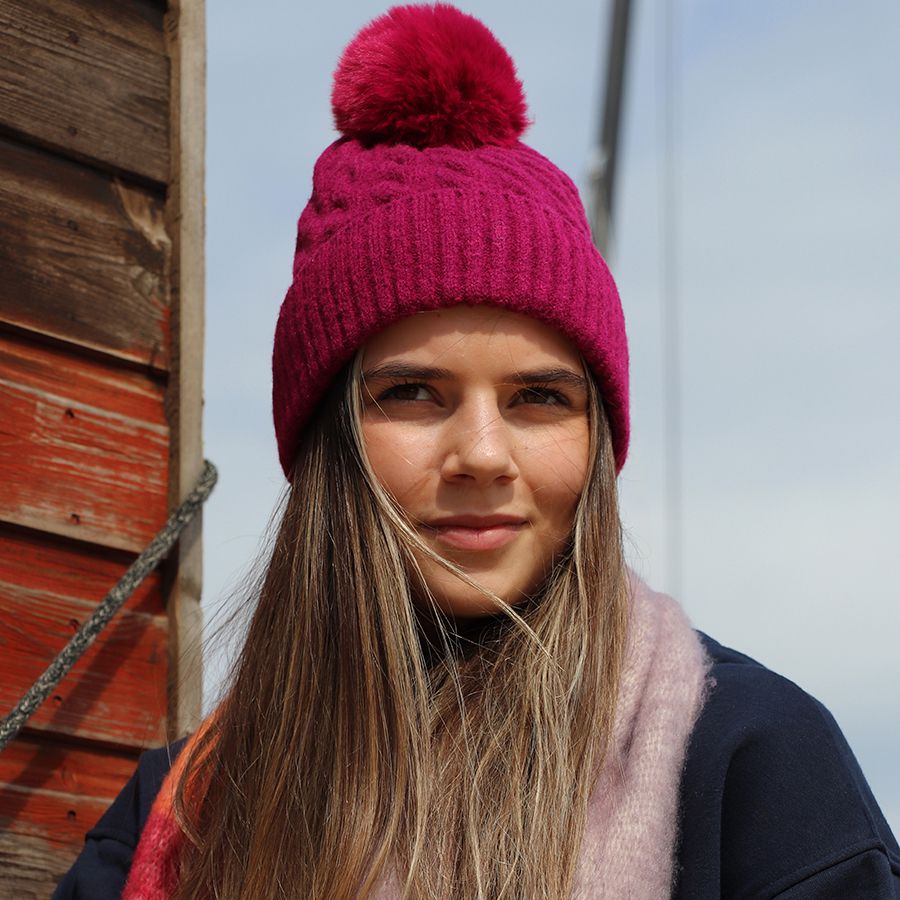 POM Magenta cable knit and faux fur bobble hat