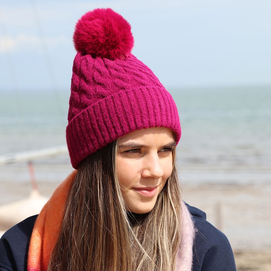 POM Magenta cable knit and faux fur bobble hat