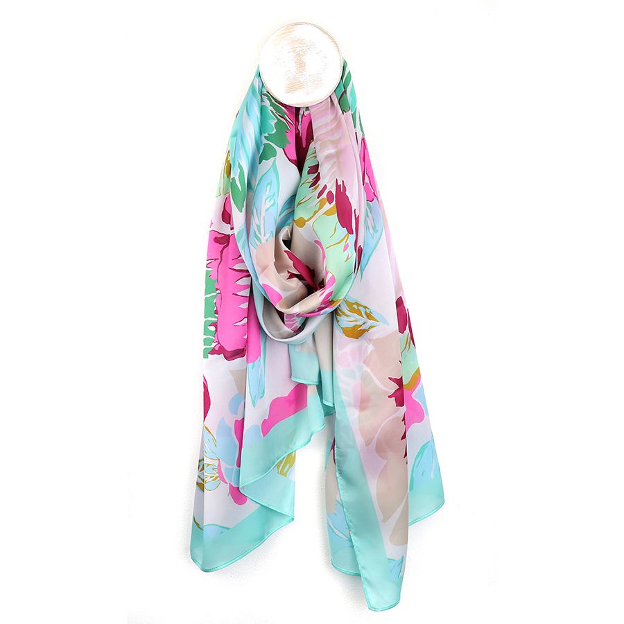 Peace Of Mind (POM) Tropical Flower Print Lightweight Silk Feel Scarf. Available at Sweet P, Burnside, Glasgow