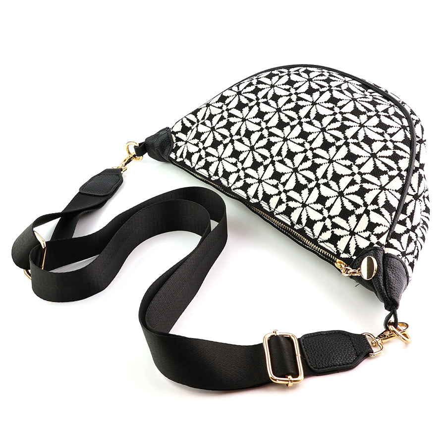 Black and white repeat print half moon bag