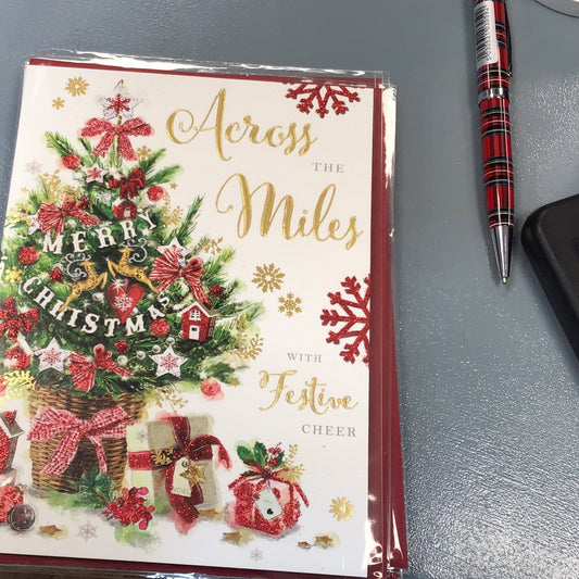 Across the miles Christmas card - Jonny Javelin - Mistletoe
