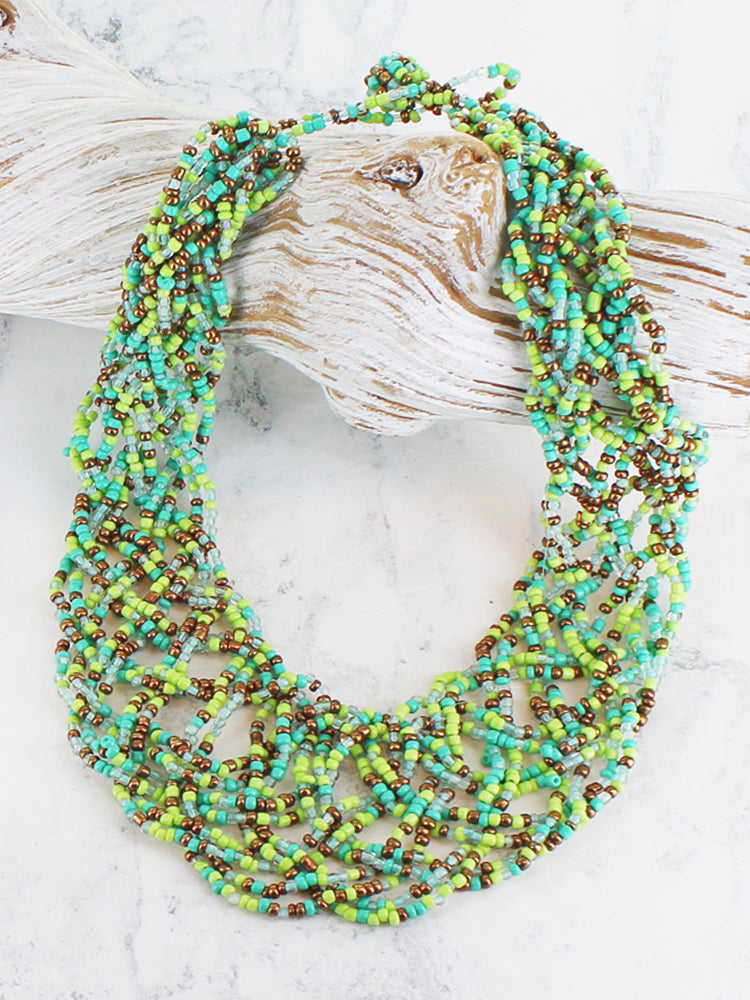 Green Plaited Beaded Collar Necklace - Handcrafted Statement Piece by Suzie Blue. Available at Sweet P, Burnside, Glasgow