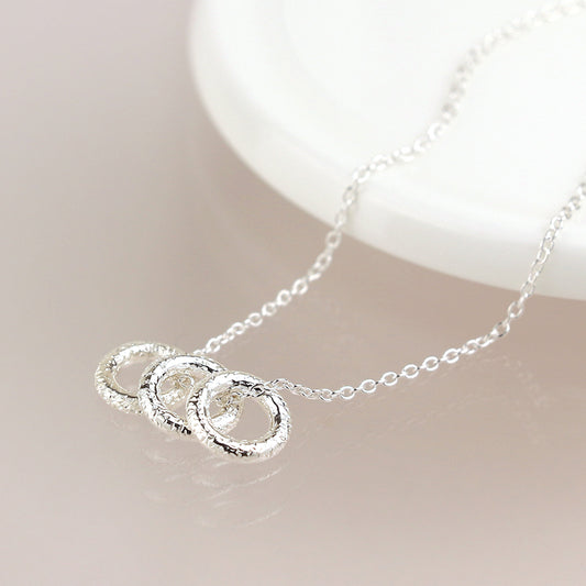 Sterling Silver Textured Triple Ring Necklace