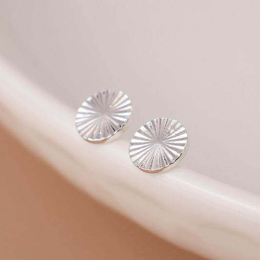 Sterling silver embossed disc earrings