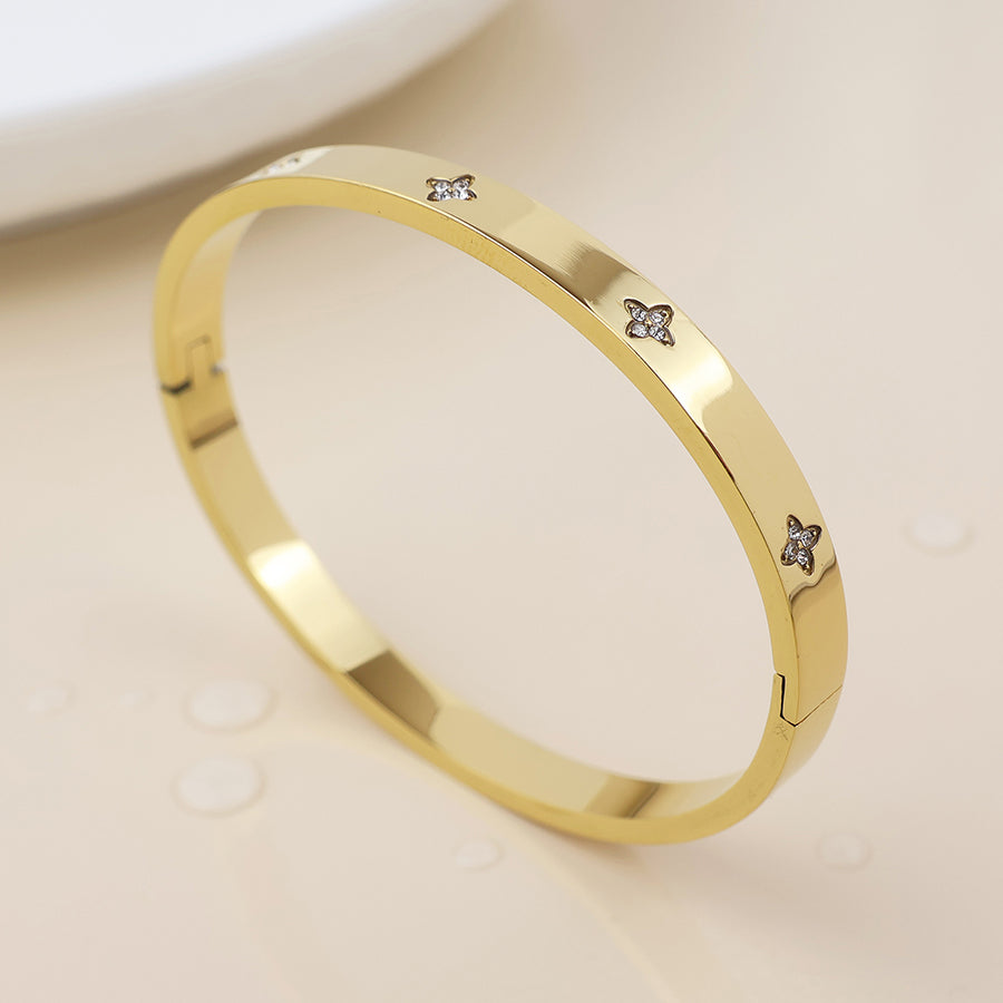 Waterproof gold plated crystal quatrefoil bangle