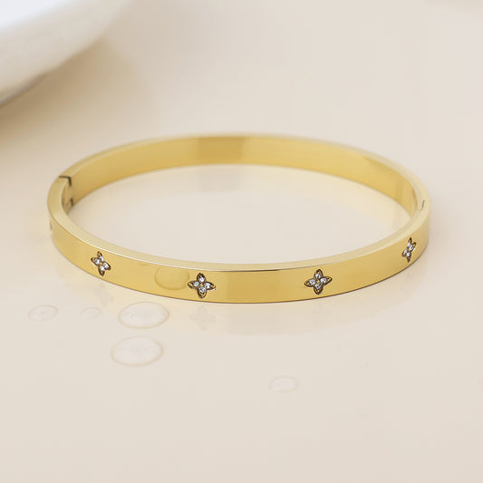 Waterproof gold plated crystal quatrefoil bangle