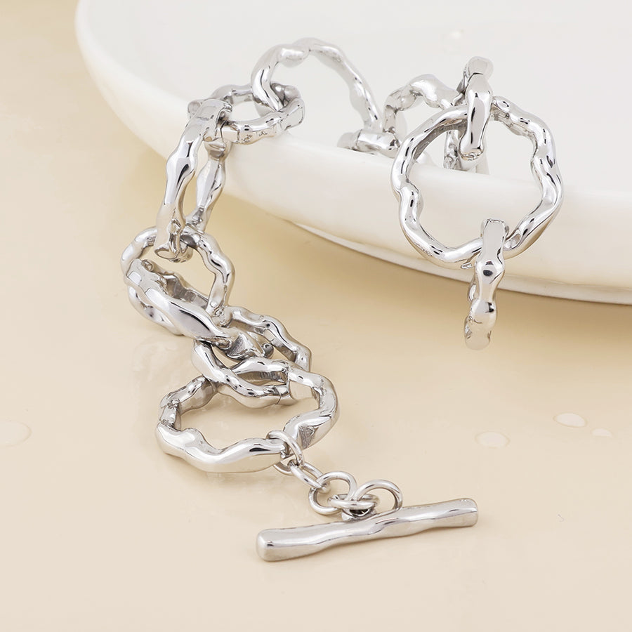 Liquid stainless steel platinum plated beaten link bracelet