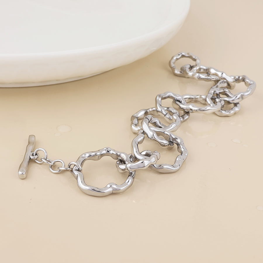Liquid stainless steel platinum plated beaten link bracelet