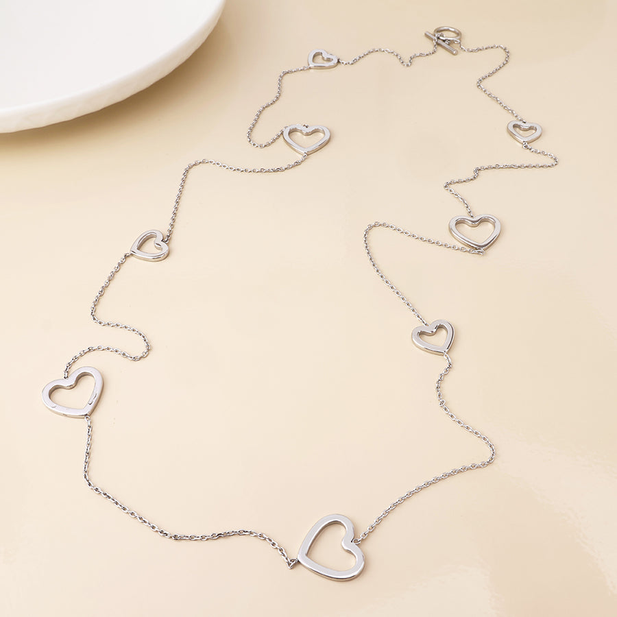 Cupid stainless steel platinum plated open hearts station necklace