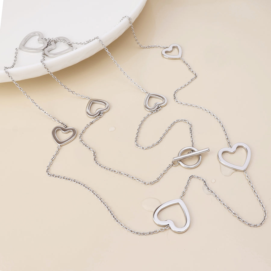 Cupid stainless steel platinum plated open hearts station necklace
