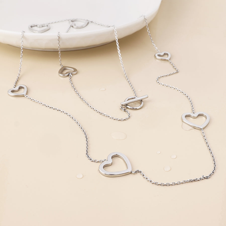 Cupid stainless steel platinum plated open hearts station necklace
