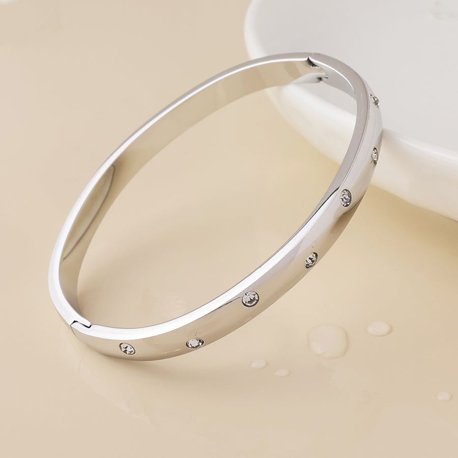 Cosmina stainless steel platinum plated crystal studded chunky bangle