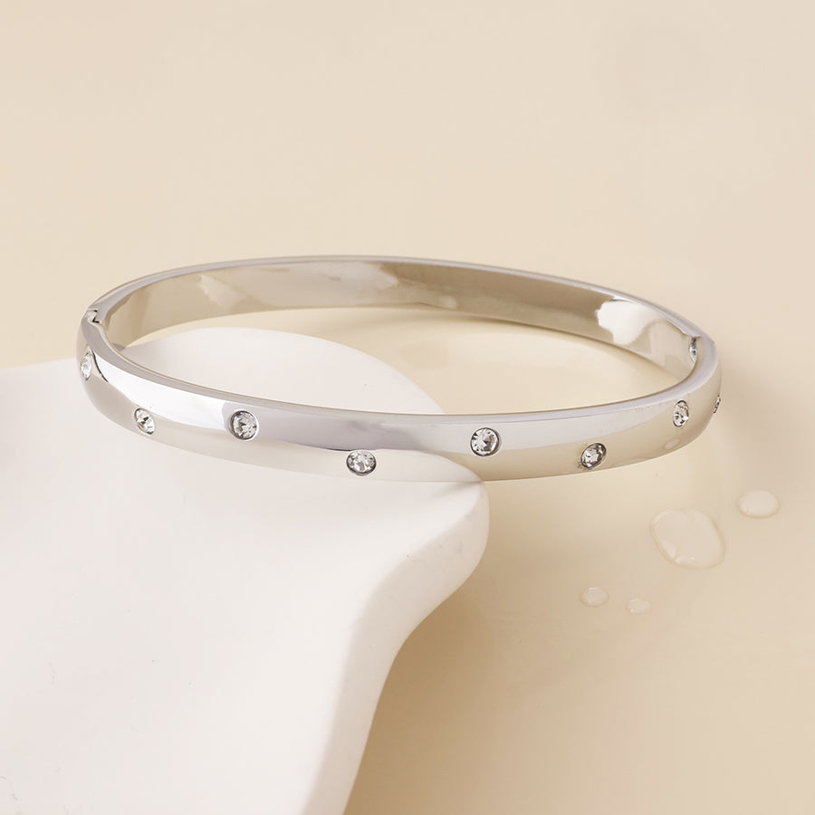 Cosmina stainless steel platinum plated crystal studded chunky bangle