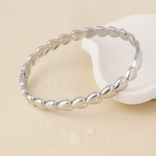 Unity stainless steel platinum plated hearts bangle