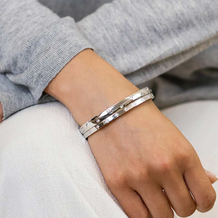 Faith stainless steel platinum plated crystal quatrefoil bangle