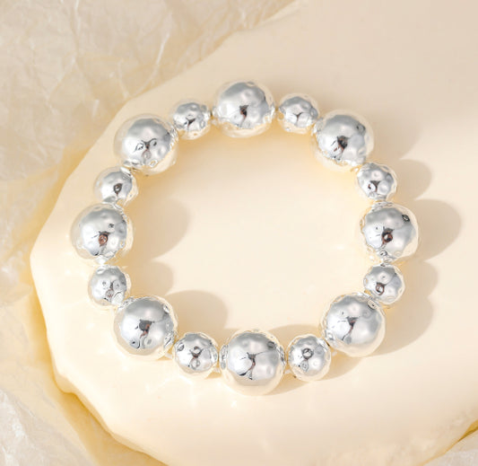 Silver Hammered Bead Stretch Bracelet