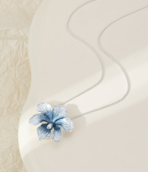Silver Pendant Necklace with Blue Flower