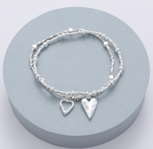 Gracee Jewellery Silver Plated Double Heart Bracelet Bracelet | Adjustable Stretch Design. Available at Sweet P, Burnside, Glsagow