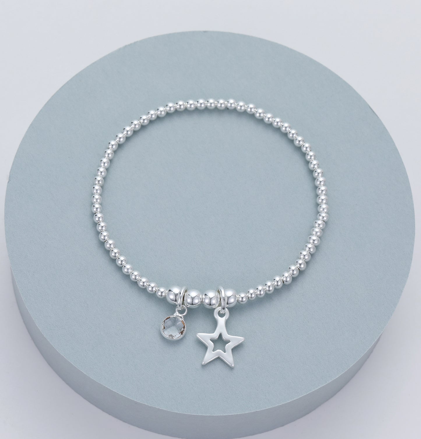 Gracee Jewellery Silver Plated Bracelet with Crystal and Star Charm | Adjustable Stretch Design. Available at Sweet P, Burnside, Glasgow